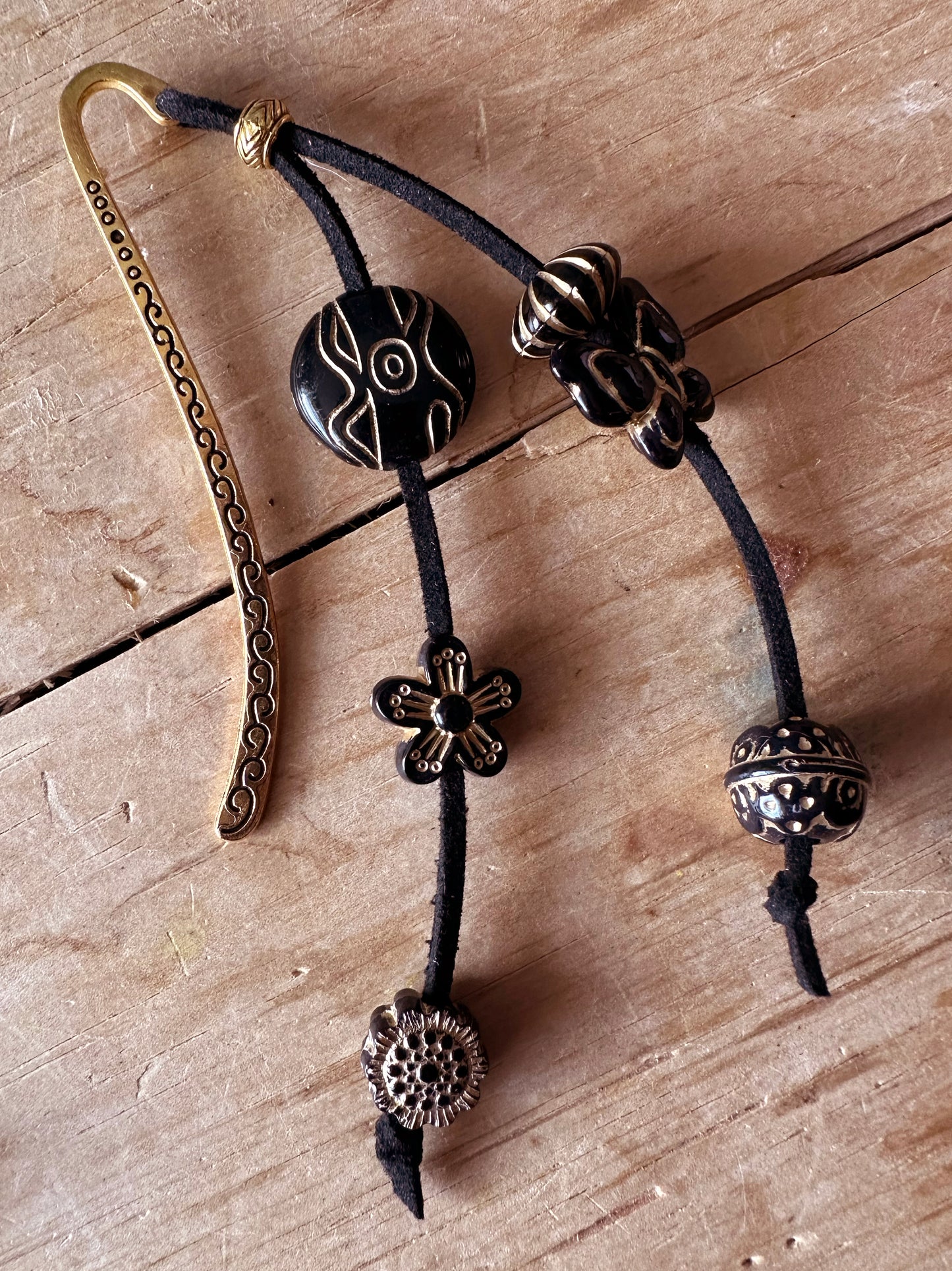 Black and gold bookmark