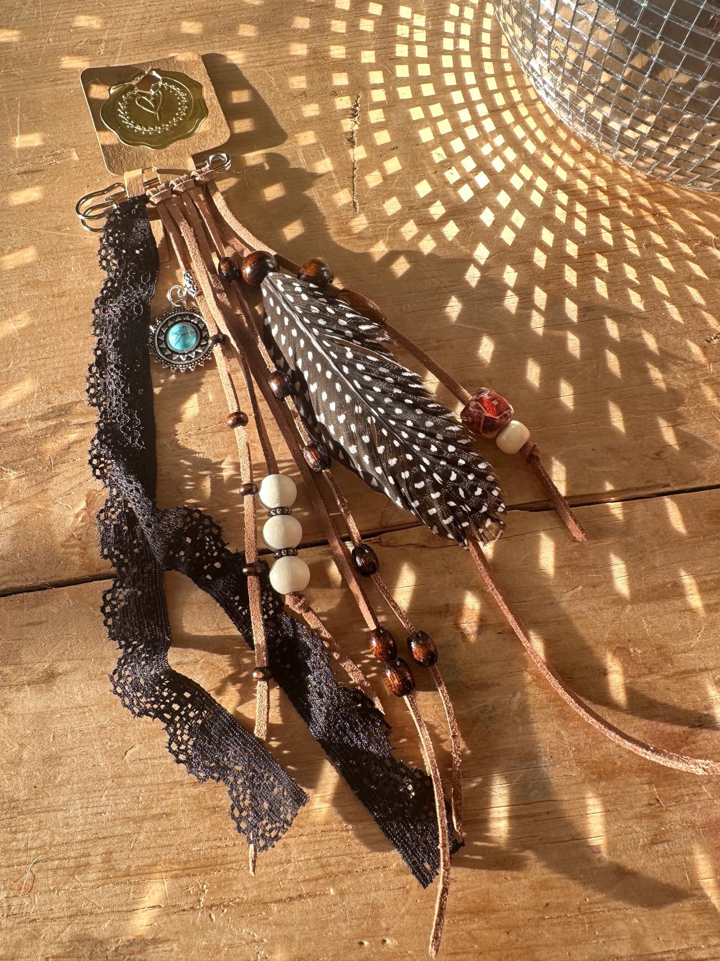 BC0056 silver and brown spotty feather tassel